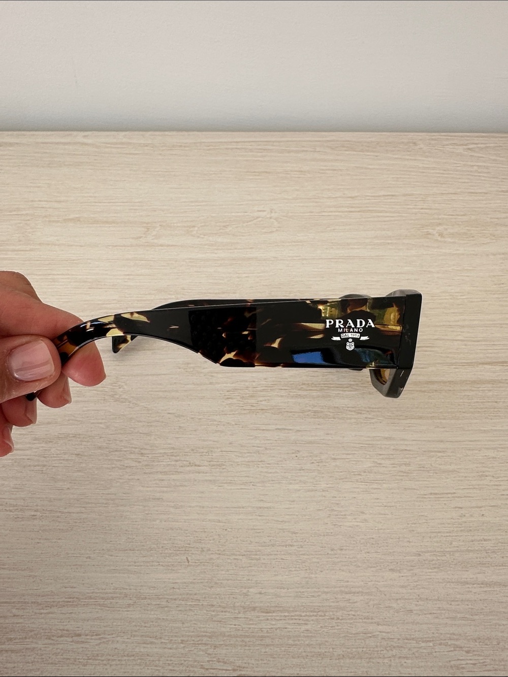 Prada Black Frame Sunglasses with Amber Lenses - Picture 2 of 3